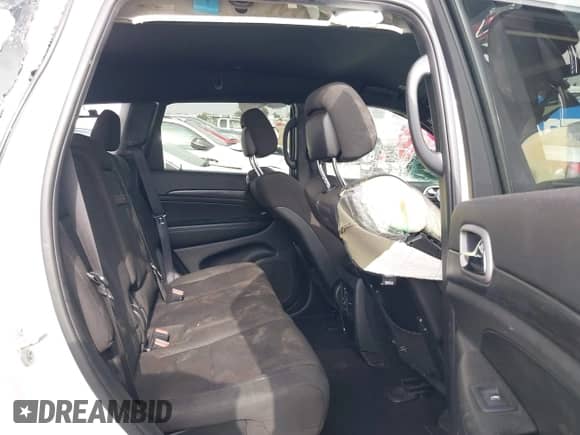 2020 Jeep Grand Cherokee Laredo E with VIN 1C4RJEAG4LC245884, listed as a IAAI auction lot 42564754 with 63,356 mi miles and . Bid and sale history available at DreamBid. Image 8.