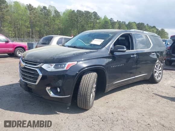 2020 Chevrolet Traverse Premier with VIN 1GNERKKW0LJ123828, listed as a IAAI auction lot 41947690 with 91,905 mi miles and . Bid and sale history available at DreamBid. Image 2.