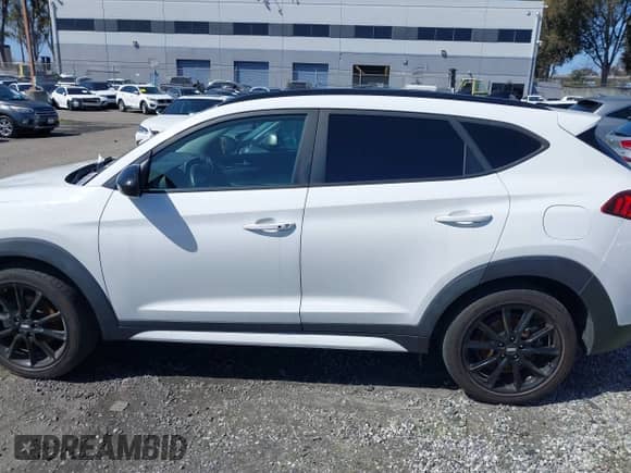 2019 Hyundai Tucson Sport z VIN KM8J33AL9KU952203, wystawiony jako IAAI lot #41367112 z przebiegiem 89 186 mil mil oraz . Historia ofert i sprzedaży dostępna na DreamBid. Obrazek 15.