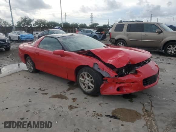 2002 Chevrolet Camaro z VIN 2G1FP22KX22108409, wystawiony jako Copart lot #73088054 z przebiegiem Nie podano mil oraz Szkoda całkowita • Salvage title. Historia ofert i sprzedaży dostępna na DreamBid. Obrazek 4.