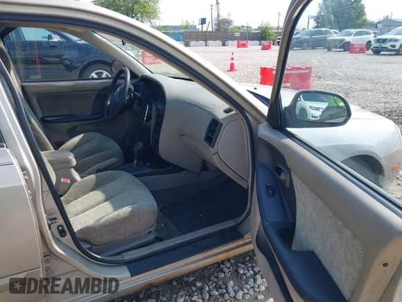 2001 Hyundai Elantra GLS with VIN KMHDN45D01U055172, listed as a IAAI auction lot 42790290 with 169,853 mi miles and . Bid and sale history available at DreamBid. Image 5.