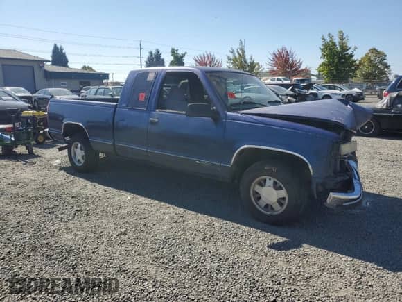 1996 Chevrolet Silverado 1500 with VIN 2GCEC19M4T1184750, listed as a Copart auction lot 83863255 with 257,892 mi miles and Salvage title. Bid and sale history available at DreamBid. Image 4.