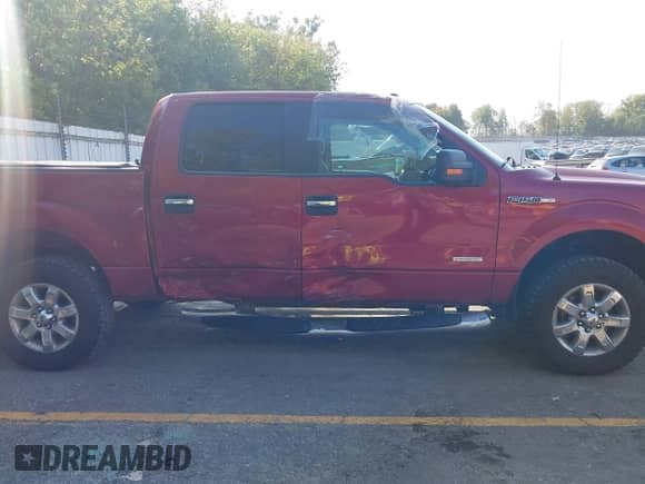 2013 Ford F-150 Lariat with VIN 1FTFW1ET5DKD04467, listed as a IAAI auction lot 43355676 with 124,871 mi miles and . Bid and sale history available at DreamBid. Image 13.