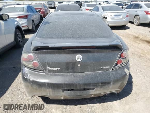 2007 Hyundai Tiburon GS z VIN KMHHM66D27U236507, wystawiony jako Copart lot #41334155 z przebiegiem 97 162 mil mil oraz Szkoda całkowita • Salvage title. Historia ofert i sprzedaży dostępna na DreamBid. Obrazek 6.