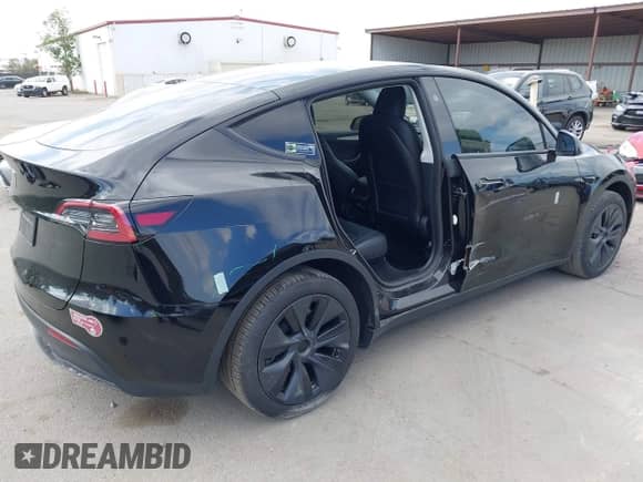 2024 Tesla Model Y with VIN 7SAYGDED8RF156984, listed as a IAAI auction lot 43324819 with 26,941 mi miles and . Bid and sale history available at DreamBid. Image 20.