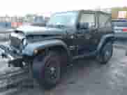 2014 Jeep Wrangler Sport z VIN 1C4AJWAG1EL327481, wystawiony jako IAAI lot #43527216 z przebiegiem 162 278 mil mil oraz . Historia ofert i sprzedaży dostępna na DreamBid. Obrazek 18.