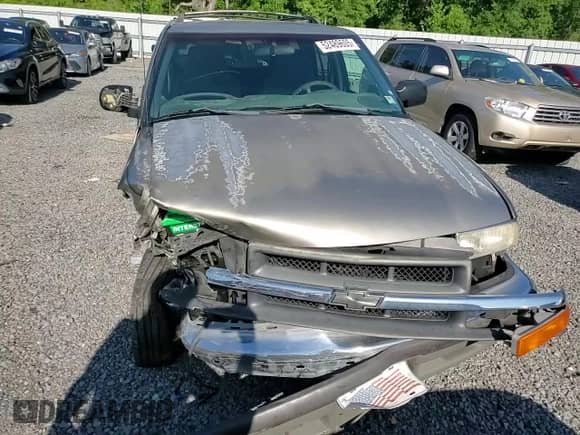 2000 Chevrolet Blazer LS z VIN 1GNCS13W7Y2376702, wystawiony jako Copart lot #52489605 z przebiegiem 137 692 mil mil oraz Szkoda całkowita • Salvage title. Historia ofert i sprzedaży dostępna na DreamBid. Obrazek 11.