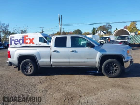 2014 GMC Sierra 1500 SLE with VIN 1GTV2UEC1EZ277382, listed as a IAAI auction lot 43487639 with 152,609 mi miles and . Bid and sale history available at DreamBid. Image 13.