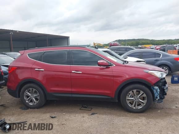 2014 Hyundai Santa Fe z VIN 5XYZUDLBXEG170657, wystawiony jako IAAI lot #43283230 z przebiegiem 116 841 mil mil oraz . Historia ofert i sprzedaży dostępna na DreamBid. Obrazek 13.