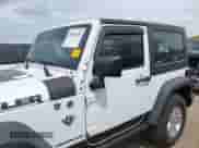 2015 Jeep Wrangler Sport with VIN 1C4AJWAG8FL606900, listed as a IAAI auction lot 42119626 with 119,268 mi miles and . Bid and sale history available at DreamBid. Image 15.