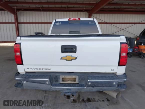 2016 Chevrolet Silverado 2500HD LT z VIN 1GC1KVE88GF247168, wystawiony jako IAAI lot #40907712 z przebiegiem Nie podano mil oraz . Historia ofert i sprzedaży dostępna na DreamBid. Obrazek 16.