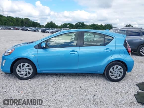 2015 Toyota Prius One z VIN JTDKDTB38F1110142, wystawiony jako IAAI lot #43032276 z przebiegiem Nie podano mil oraz . Historia ofert i sprzedaży dostępna na DreamBid. Obrazek 13.