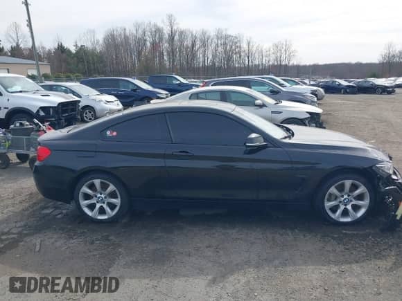 2014 BMW 4 Series 435i xDrive z VIN WBA3R5C54EK188957, wystawiony jako IAAI lot #41790183 z przebiegiem 97 981 mil mil oraz . Historia ofert i sprzedaży dostępna na DreamBid. Obrazek 13.