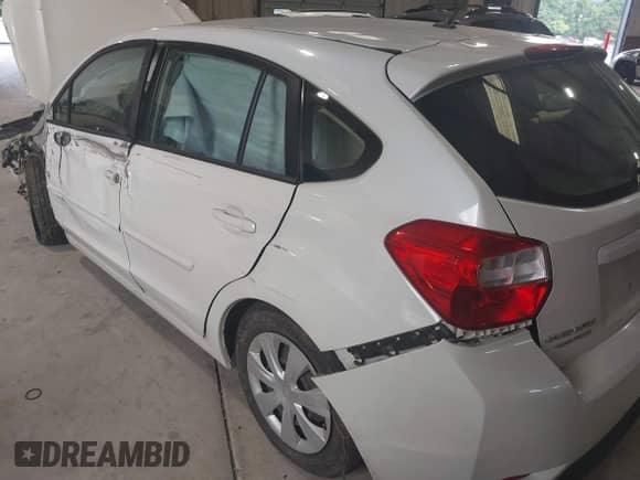 2015 Subaru Impreza 2.0i z VIN JF1GPAA62F8200543, wystawiony jako IAAI lot #42687551 z przebiegiem 125 415 mil mil oraz . Historia ofert i sprzedaży dostępna na DreamBid. Obrazek 6.