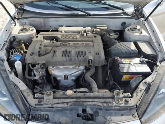 2008 Hyundai Tiburon GS с VIN KMHHM66D68U296212, выставлен на аукционе Copart как лот 88536725 с пробегом 116 240 миль миль и Списание • Salvage title. История ставок и продаж доступна на DreamBid. Изображение 13.