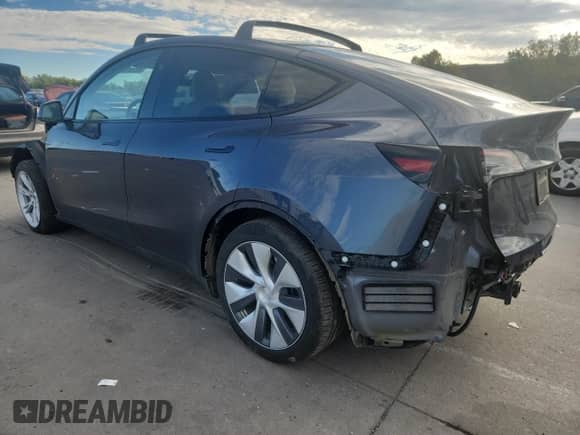2023 Tesla Model Y Long Range with VIN 7SAYGDEE9PA177409, listed as a Copart auction lot 82331145 with 31,390 mi miles and Salvage title. Bid and sale history available at DreamBid. Image 2.