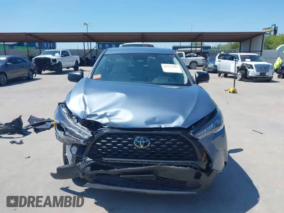 2025 Toyota Corolla Cross L with VIN 7MUAAAAG4SV120764, listed as a IAAI auction lot 43127261 with 6,567 mi miles and . Bid and sale history available at DreamBid. Image 13.