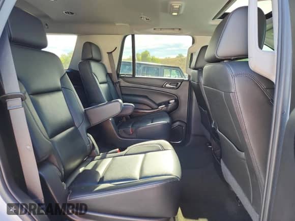 2018 Chevrolet Tahoe LT z VIN 1GNSKBKCXJR369197, wystawiony jako Copart lot #84227515 z przebiegiem 92 184 mil mil oraz Szkoda całkowita • Salvage title. Historia ofert i sprzedaży dostępna na DreamBid. Obrazek 11.