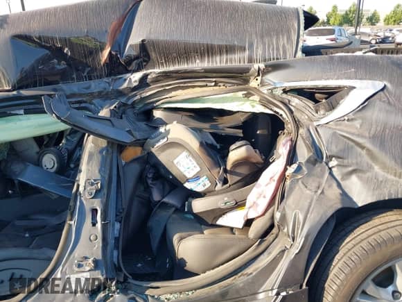 2015 Chevrolet Impala LT z VIN 1G1125S3XFU132390, wystawiony jako IAAI lot #42952565 z przebiegiem Nie podano mil oraz . Historia ofert i sprzedaży dostępna na DreamBid. Obrazek 8.