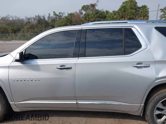 2021 Chevrolet Traverse Premier with VIN 1GNEVKKW9MJ213346, listed as a IAAI auction lot 41591024 with 112,803 mi miles and . Bid and sale history available at DreamBid. Image 14.