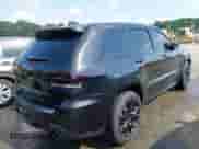 2014 Jeep Grand Cherokee SRT-8 z VIN 1C4RJFDJ2EC174412, wystawiony jako IAAI lot #42116541 z przebiegiem 124 693 mil mil oraz . Historia ofert i sprzedaży dostępna na DreamBid. Obrazek 4.