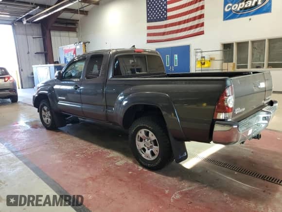 2015 Toyota Tacoma with VIN 5TFUU4EN7FX144906, listed as a Copart auction lot 86407125 with 86,038 mi miles and Salvage title. Bid and sale history available at DreamBid. Image 2.