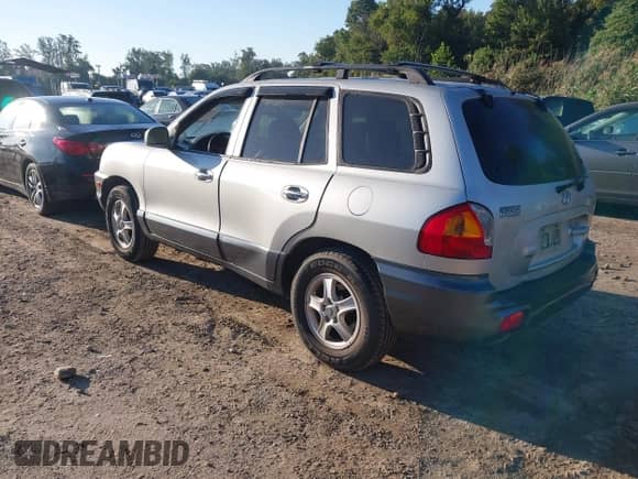 2004 Hyundai Santa Fe GLS z VIN KM8SC73E34U704154, wystawiony jako IAAI lot #43380665 z przebiegiem 68 777 mil mil oraz . Historia ofert i sprzedaży dostępna na DreamBid. Obrazek 3.