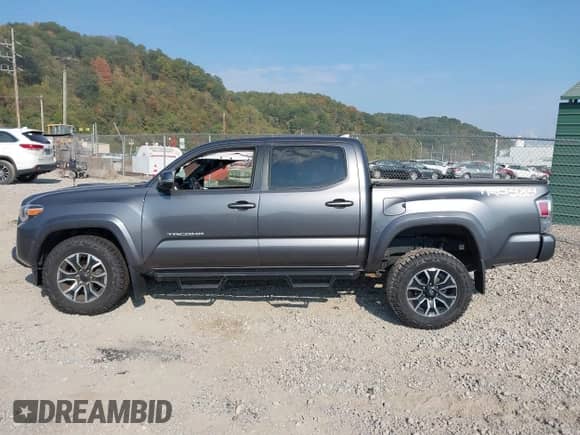 2021 Toyota Tacoma SR with VIN 3TYCZ5AN0MT027247, listed as a IAAI auction lot 43234020 with 26,058 mi miles and . Bid and sale history available at DreamBid. Image 15.