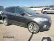 2017 Ford Escape SE с VIN 1FMCU9GD1HUD88001, выставлен на аукционе Copart как лот 69301435 с пробегом 270 864 миль миль и Чистый • Clean title. История ставок и продаж доступна на DreamBid. Изображение 4.