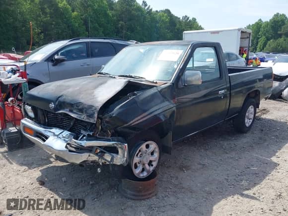 1997 Nissan Frontier XE z VIN 1N6SD11SXVC320206, wystawiony jako IAAI lot #42435128 z przebiegiem 299 944 mil mil oraz . Historia ofert i sprzedaży dostępna na DreamBid. Obrazek 2.