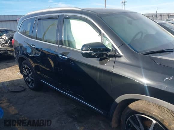 2022 Honda Pilot Elite with VIN 5FNYF6H03NB085997, listed as a IAAI auction lot 41823176 with 21,646 mi miles and . Bid and sale history available at DreamBid. Image 6.