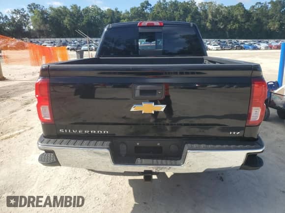 2017 Chevrolet Silverado 1500 LTZ with VIN 3GCPCSEC8HG300946, listed as a Copart auction lot 69234435 with 95,792 mi miles and Salvage title. Bid and sale history available at DreamBid. Image 6.