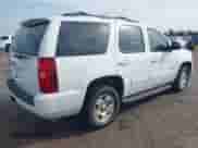 2013 Chevrolet Tahoe LS with VIN 1GNSCAE00DR266240, listed as a IAAI auction lot 42666283 with 144,846 mi miles and . Bid and sale history available at DreamBid. Image 4.