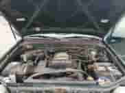 2001 Toyota Tundra Limited z VIN 5TBBT48171S143054, wystawiony jako Copart lot #71740305 z przebiegiem 121 330 mil mil oraz Czysty tytuł • Clean title. Historia ofert i sprzedaży dostępna na DreamBid. Obrazek 11.