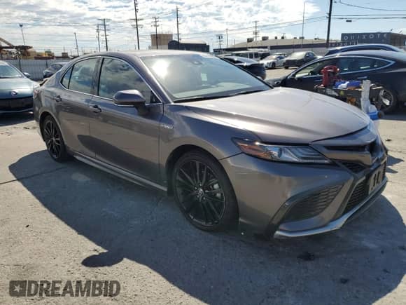 2021 Toyota Camry Hybrid XSE with VIN 4T1K31AK9MU565539, listed as a Copart auction lot 86149585 with 115,658 mi miles and Salvage title. Bid and sale history available at DreamBid. Image 4.