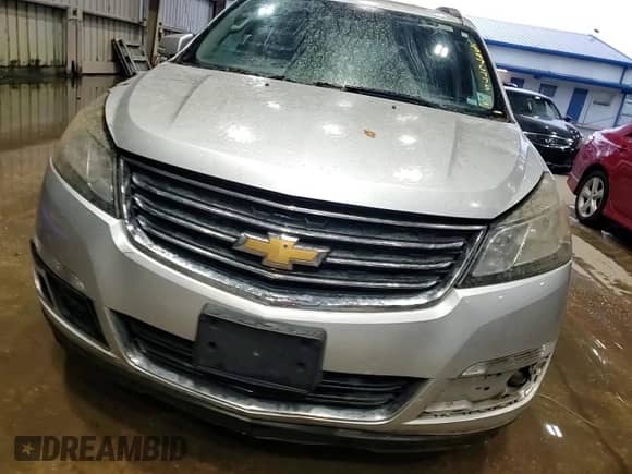 2016 Chevrolet Traverse LT z VIN 1GNKVHKD1GJ104744, wystawiony jako Copart lot #63876775 z przebiegiem Nie podano mil oraz Szkoda całkowita • Salvage title. Historia ofert i sprzedaży dostępna na DreamBid. Obrazek 13.