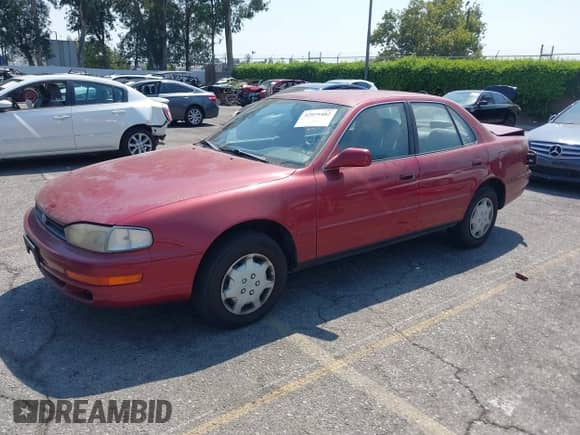 1994 Toyota Camry LE z VIN 4T1SK12E3RU361550, wystawiony jako IAAI lot #42975482 z przebiegiem 182 006 mil mil oraz . Historia ofert i sprzedaży dostępna na DreamBid. Obrazek 2.
