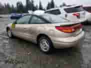 1997 Saturn SC с VIN 1G8ZG1279VZ308316, выставлен на аукционе Copart как лот 87381914 с пробегом 93 654 миль миль и Списание • Salvage title. История ставок и продаж доступна на DreamBid. Изображение 2.