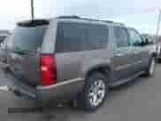 2014 Chevrolet Suburban LTZ with VIN 1GNSKKE77ER152503, listed as a IAAI auction lot 42105720 with 152,767 mi miles and . Bid and sale history available at DreamBid. Image 4.