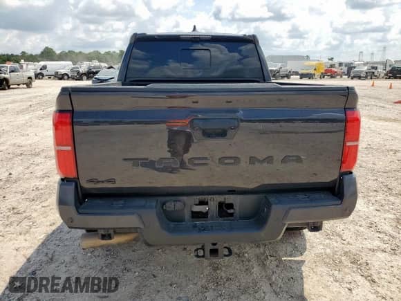2024 Toyota Tacoma SR5 with VIN 3TMLB5JN1RM024042, listed as a Copart auction lot 70640855 with 23,853 mi miles and Salvage title. Bid and sale history available at DreamBid. Image 6.