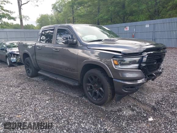 2021 Ram 1500 Laramie z VIN 1C6SRFJT8MN736615, wystawiony jako IAAI lot #42657835 z przebiegiem 48 020 mil mil oraz . Historia ofert i sprzedaży dostępna na DreamBid. Obrazek 1.