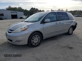 2010 Toyota Sienna XLE с VIN 5TDYK4CC8AS339789, выставлен на аукционе Copart как лот 85838045 с пробегом 178 977 миль миль и Списание • Salvage title. История ставок и продаж доступна на DreamBid. Изображение 1.
