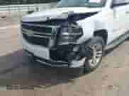 2019 Chevrolet Tahoe LT with VIN 1GNSCBKCXKR276758, listed as a IAAI auction lot 43302261 with 92,687 mi miles and . Bid and sale history available at DreamBid. Image 6.