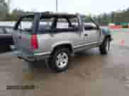 1998 Chevrolet Tahoe z VIN 3GNEK18R0WG121275, wystawiony jako IAAI lot #41721304 z przebiegiem Nie podano mil oraz . Historia ofert i sprzedaży dostępna na DreamBid. Obrazek 4.