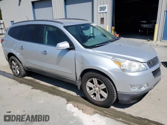 2011 Chevrolet Traverse 2LT с VIN 1GNKVJED8BJ100220, выставлен на аукционе Copart как лот 68747355 с пробегом 150 086 миль миль и Списание • Salvage title. История ставок и продаж доступна на DreamBid. Изображение 4.