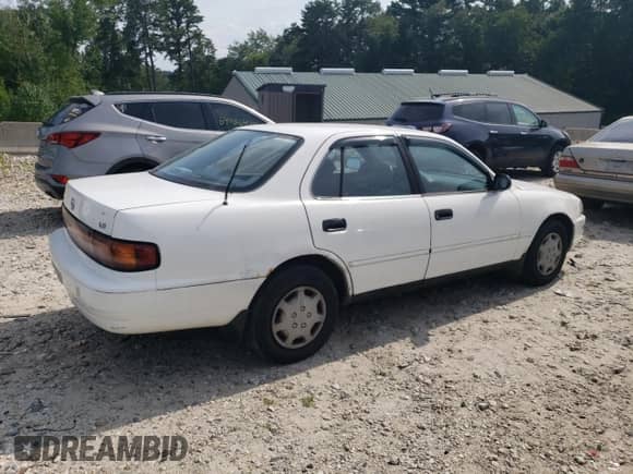 1992 Toyota Camry LE с VIN 4T1SK12E4NU035718, выставлен на аукционе Copart как лот 65820495 с пробегом 173 695 миль миль и Чистый • Clean title. История ставок и продаж доступна на DreamBid. Изображение 3.