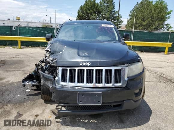 2012 Jeep Grand Cherokee Laredo с VIN 1C4RJEAT6CC301188, выставлен на аукционе Copart как лот 59602325 с пробегом 163 126 миль миль и Списание • Salvage title. История ставок и продаж доступна на DreamBid. Изображение 5.