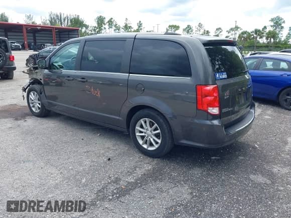 2018 Dodge Grand Caravan SXT with VIN 2C4RDGCGXJR173545, listed as a IAAI auction lot 43315815 with 40,978 mi miles and . Bid and sale history available at DreamBid. Image 3.