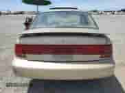 1998 Saturn SL with VIN 1G8ZK5272WZ276073, listed as a Copart auction lot 69880235 with 147,663 mi miles and Salvage title. Bid and sale history available at DreamBid. Image 6.