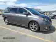 2013 Toyota Sienna SE with VIN 5TDXK3DCXDS347384, listed as a Copart auction lot 70305815 with 94,648 mi miles and Salvage title. Bid and sale history available at DreamBid. Image 4.